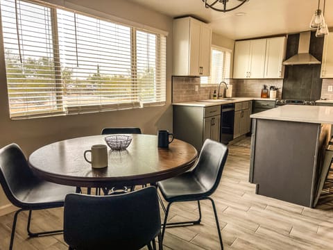 Breakfast nook attached to kitchen.