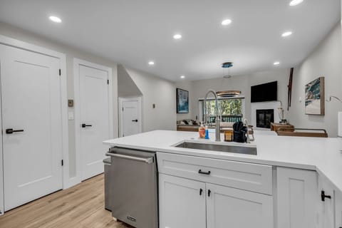 Kitchen: Well-equipped kitchen, updated appliances, drip coffee maker and French Press, kitchen bar w/4 bar stools 
