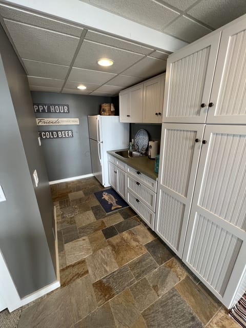 Kitchenette in lower level, refrigerator is reserved for host