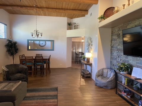 Living and Dining area. 65" Vizio Smart TV. Dining seats 6. 