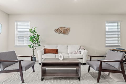 Main living room with 65" smart TV.