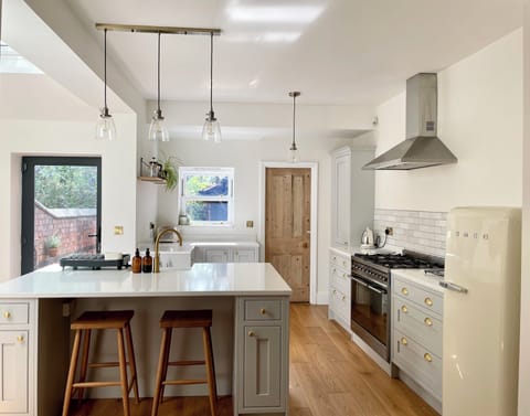The newly renovated kitchen has everything you need to cook during your stay. 