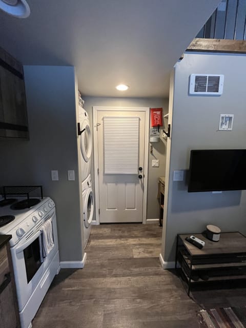 Door leading to garage where you will park and store your gear 