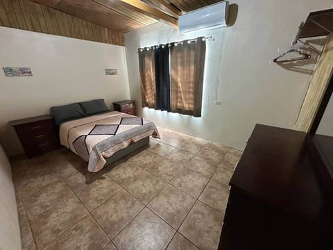 1 bedroom with 1 full size bed and an inverter air conditioned.