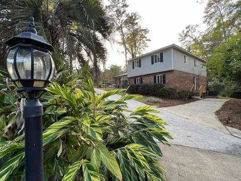 Side view of home - side drive for more parking space.