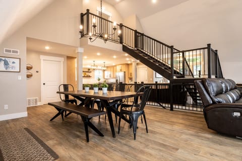 Main level view of dining table and kitchen