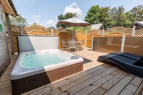 Decking with private hot tub and seating, perfect for relaxing and socialising