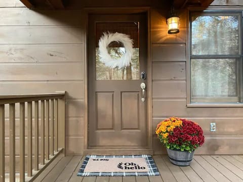 Open the door to your peaceful vacation home at Creekhaven cabin.