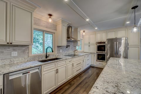 Fully stocked kitchen, high end appliances, wide walkway for multiple cooks.