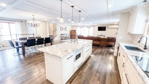 9.5' island with power on both sides accommodates lots of crockpots, etc.