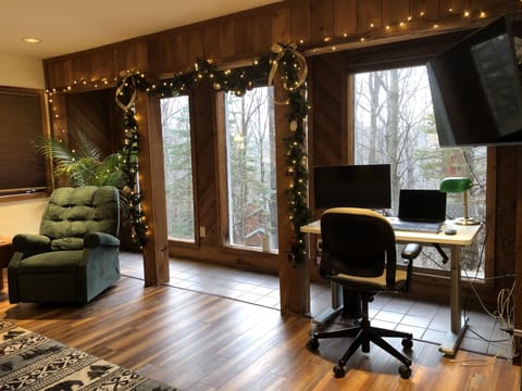 Living room & work station with large picture windows