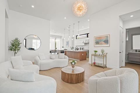 Bright open living & dining with 14ft ceilings