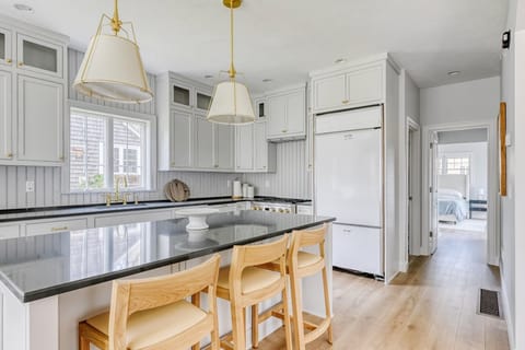 Remodeled kitchen. Cabinet panel will go on refrigerator and freezer.