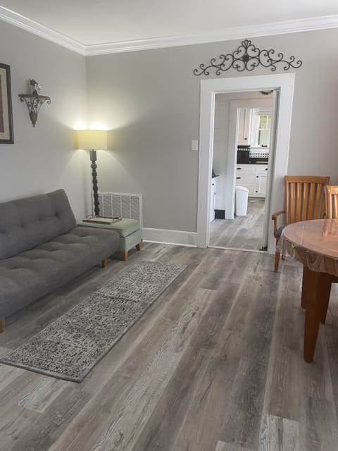 Huge dining room also has a futon for extra seating or sleeping.