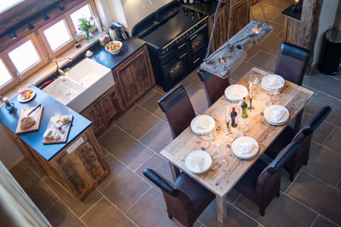The view from the mezzanine to the kitchen and dining areas.