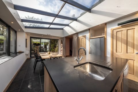 Kitchen from behind kitchen island