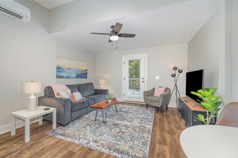 Cozy living room with 55" TV and direct access to your own, private deck.