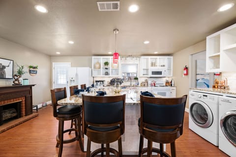 Elegant and spacious kitchen with all the cooking, dining and washing needs.
