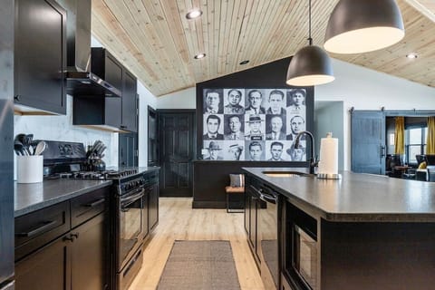 Kitchen comes with pots, pans, mixing bowls, utensils, dinnerware, dishwasher, microwave, stove, blender, toaster, etc.