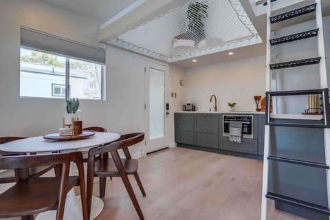 This door takes you from the yard area into the Kitchen and Dining area. What is that up top? Oh thats what put the NET in #TheMaisonNet… we will get to that in a second :) 
