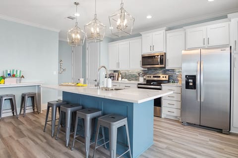 Beautiful modern kitchen with ample storage.