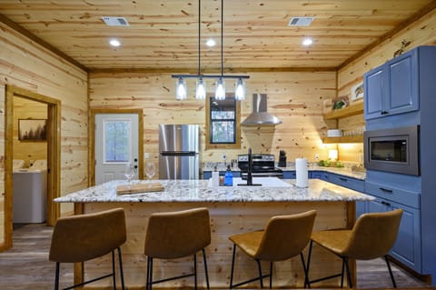 Cook together and relax with bar seating for 4.