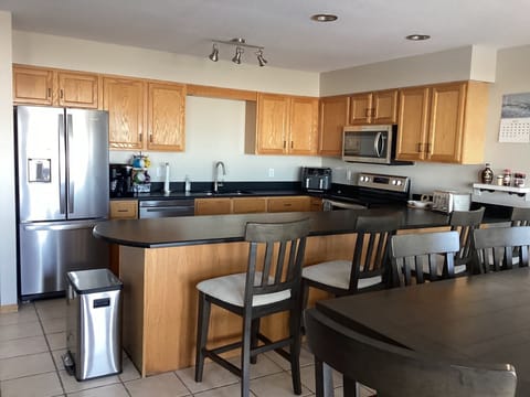 Well stocked kitchen; coffee maker, air fryer, complete sets of dishes and pans.