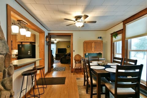 Convenient snack bar to sit at or pass all the great foods from the kitchen to the dining area for a real sit-down meal.