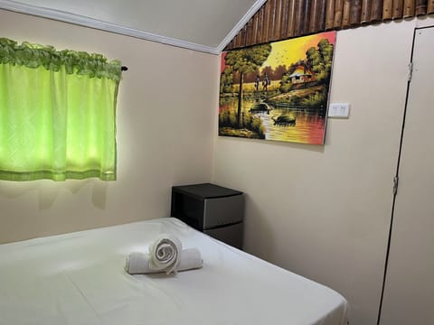 Conditioned cottage (bahay kubo) with en-suite bathroom.