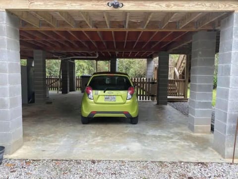 Under house parking. Plus parking in front.