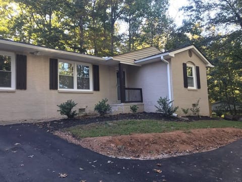 Front of home with parking for up to 5 cars