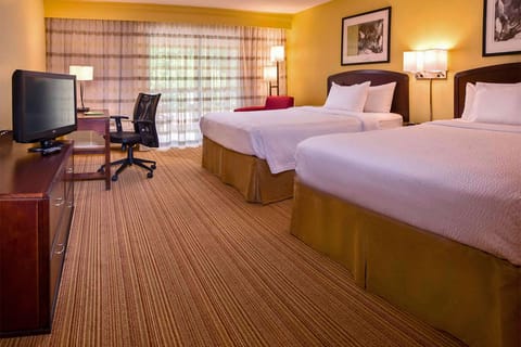 Settle into crisp beds and stretch out in spacious comfort.
