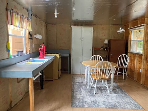 Guest cabin, kitchen and dining area