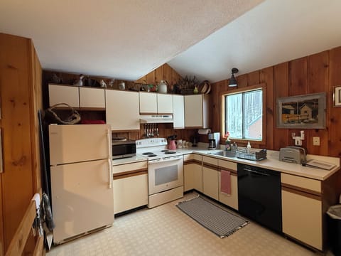 Full kitchen stocked with condiments and all the extras. Room for several chefs!