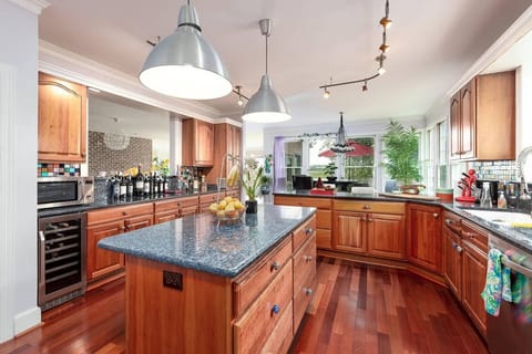 1st Floor Large Chef's Kitchen with wine cooler, island, passthrough bar, extra seating for 3 at the kitchen bar as well