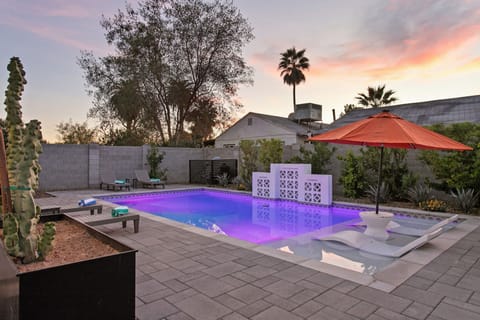 Dive into your private oasis as desert palms sway overhead and LED lights transform your evening swim into pure magic.