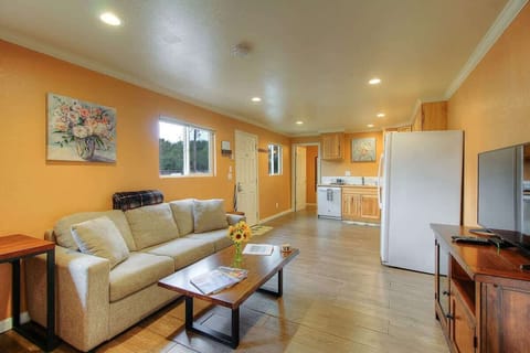 Spacious living room attached to kitchen for spending quality tie with your friends and family. Multiple windows for plenty of natural light.