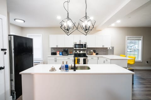 There is plenty of countertop space with the kitchen island.
