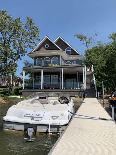 Waterfront view of cabin and dock