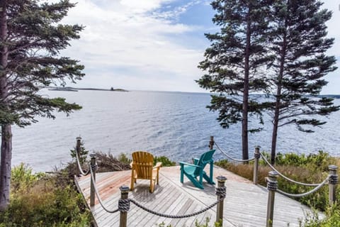 Enjoy your coffee or glass of wine right on the water listening to the waves.