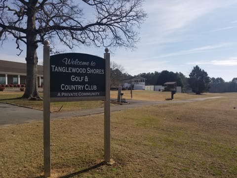 Local golf course in the neighborhood with pool and club house.