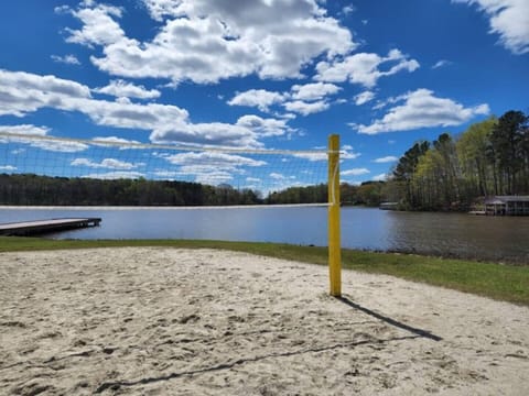 Beach area. 3 minute walk that includes volleyball, Boat Ramp, Basketball, Dock