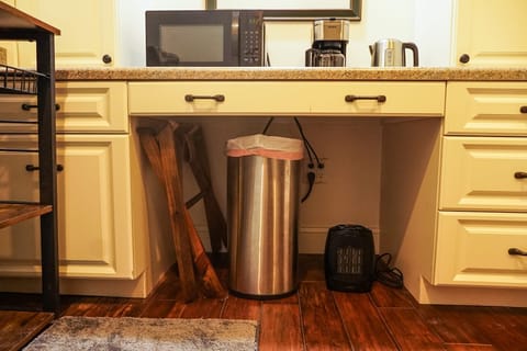 foldable luggage rack, ironing board & iron, space heater if needed