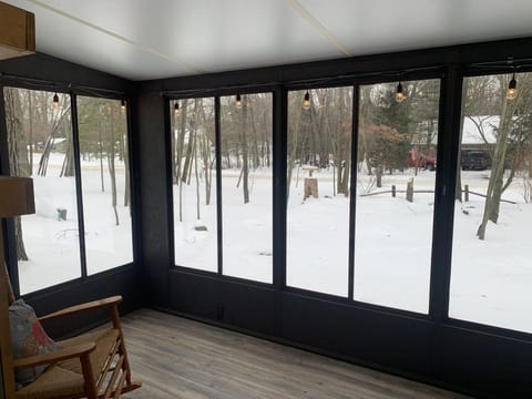 Enclosed porch to enjoy wildlife