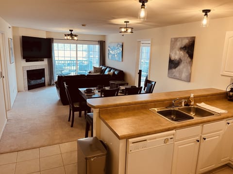 Large kitchen and living room that walks out to screened in patio