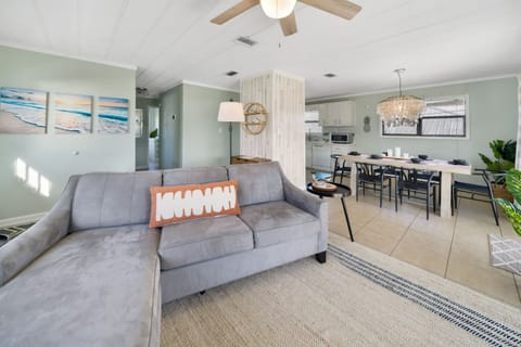 With an open concept design and abundant natural light, this inviting space is perfect for relaxing and unwinding after a day in the sun.