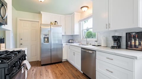 Kitchen adjacent to garage