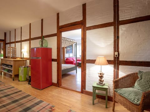 Furniture, Wood, Flooring, Comfort, Architecture, Interior Design, Floor, Hardwood, Living Room, Lamp