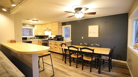 Dining Table and Serving Bar in Private Waterville Estates Home