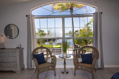 Enjoy coffee in your master suite with this exquisite view of the canal!